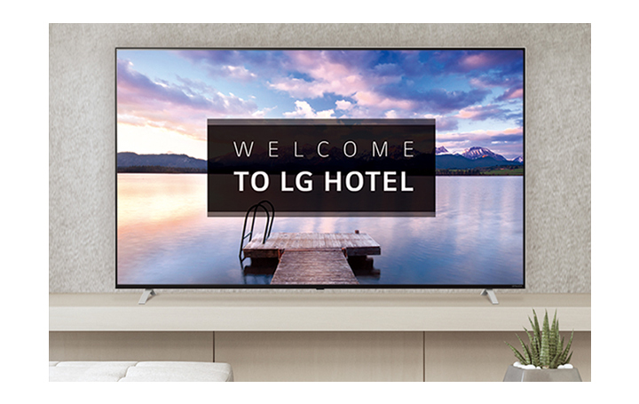 The LG Commercial TV is screening greeting messages with images.