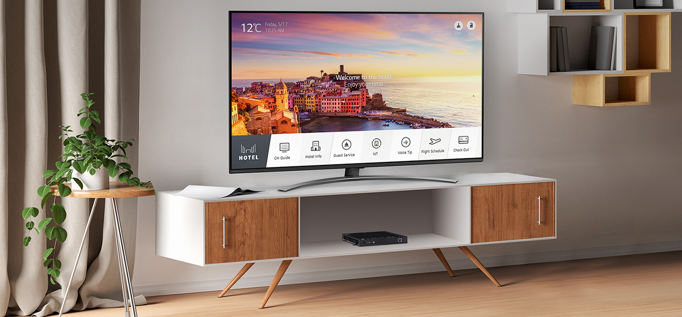 There is a simulated image to show Pro:Centric Set Top Box, STB-6500, installed in the hotel room. The TV connected to STB-6500 provides various information and services to guests.