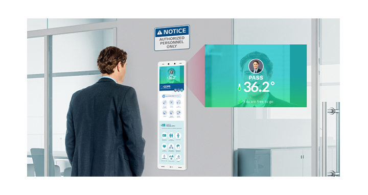 The identification check is made by LG Thermal Sensing Terminal for an employee to enter the restricted area and the zoomed screen identifies him as a member of the company and allows him to enter.