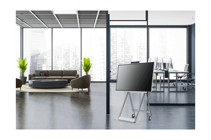 The LG One:Quick Flex is placed between the office and lounge, showing its wheel.