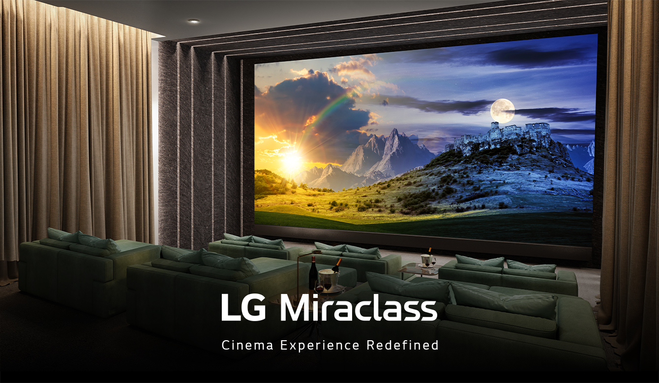 A large LED screen is showing a colorful and wonderful landscape scene at a movie theater.