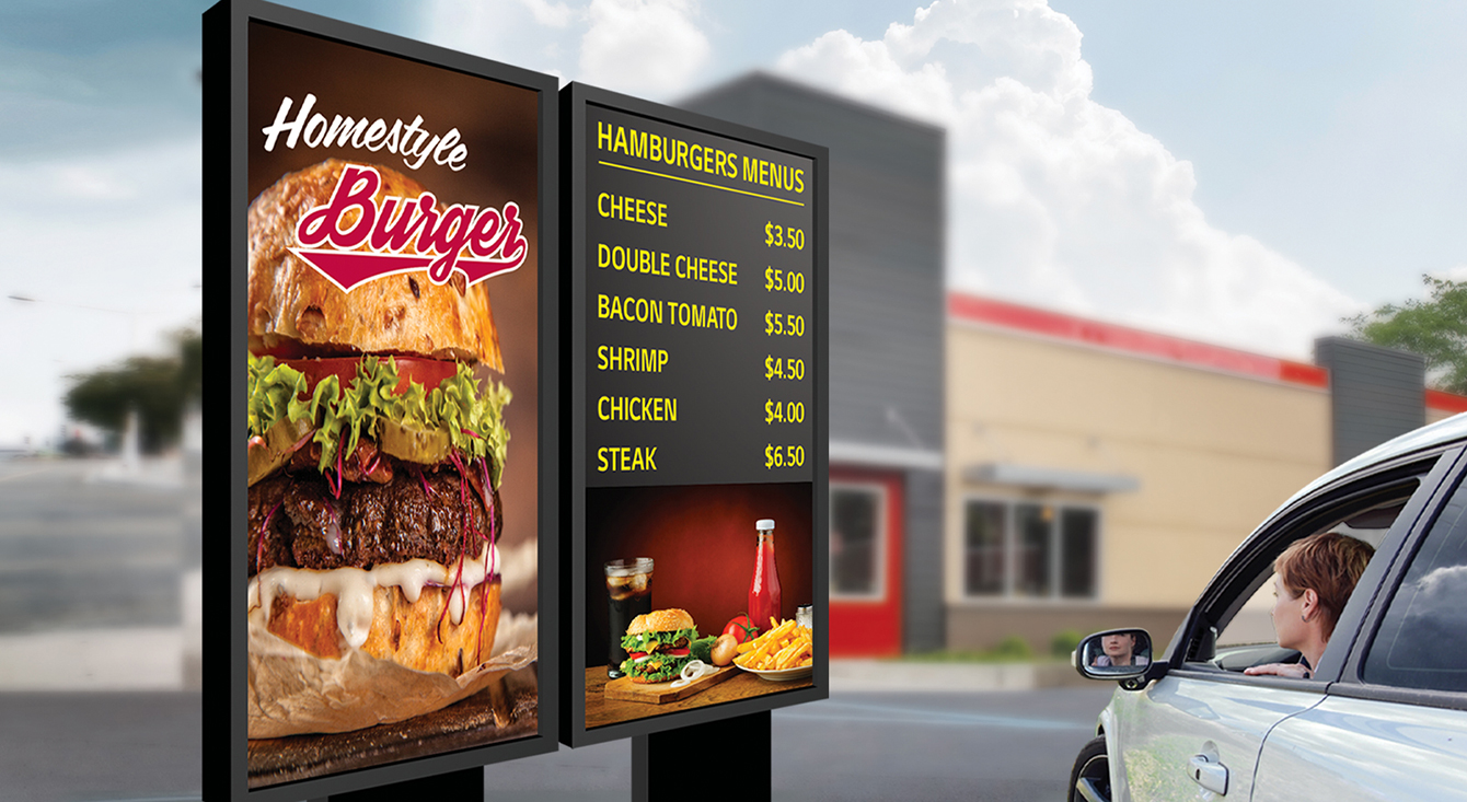 In front of the burger drive-thru store, there is an XF3C-B installed, displaying burger menus and other advertisements.