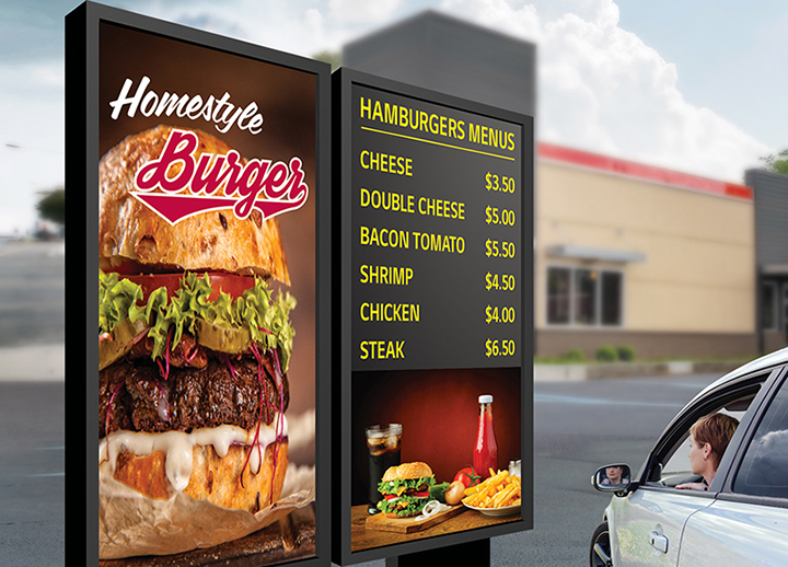 In front of the burger drive-thru store, there is an XF3C-B installed, displaying burger menus and other advertisements.