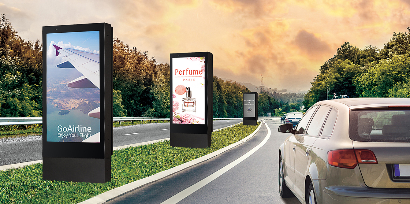 There is an XE3C installed on the roadside, displaying various advertisements.