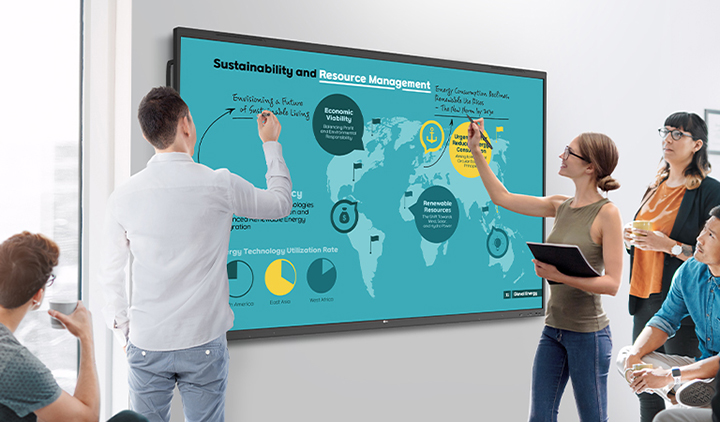 In the meeting room, individuals are actively exchanging ideas by writing on the LG CreateBoard screen at the same time.