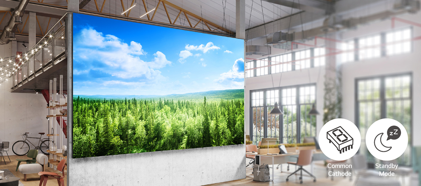 The LG MAGNIT, which increases energy efficiency through Common Cathode technology and features such as Standby Mode, is prominently installed on a large wall in the center of the office, providing a spacious and eco-friendly atmosphere.