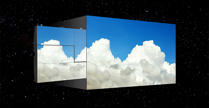 The LG MAGNIT screen, with minimal gaps between modules, shows the blue sky and puffy clouds without color deviation..